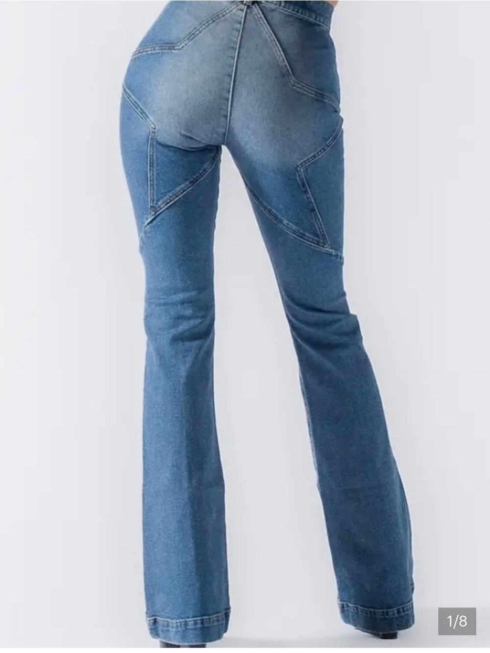 Revice Star bottom blue jeans. Size 23. Hemmed in front seam and bell bottom.